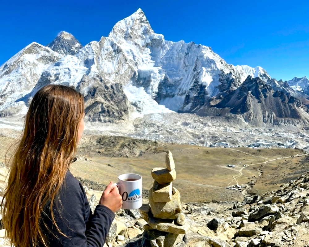 Woman overlooking the Himalayas